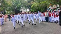 Pelajar SD hingga SMA Ramaikan Lomba Gerak Jalan HUT ke-24 Parimo